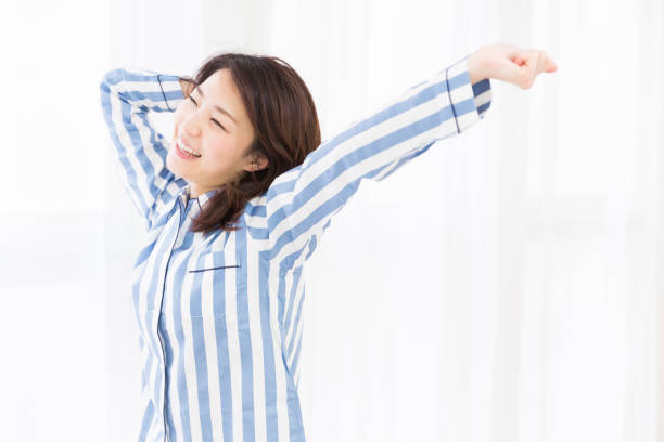 istock woman in night clothes 872257088