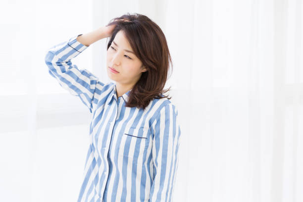 istock woman in night clothes,glum 872257102