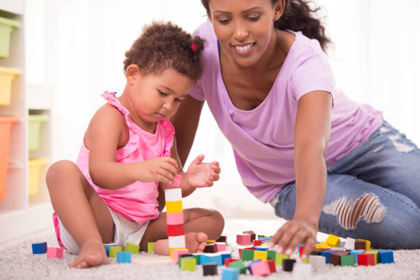 istock Mother and daughter playing time. 872281890