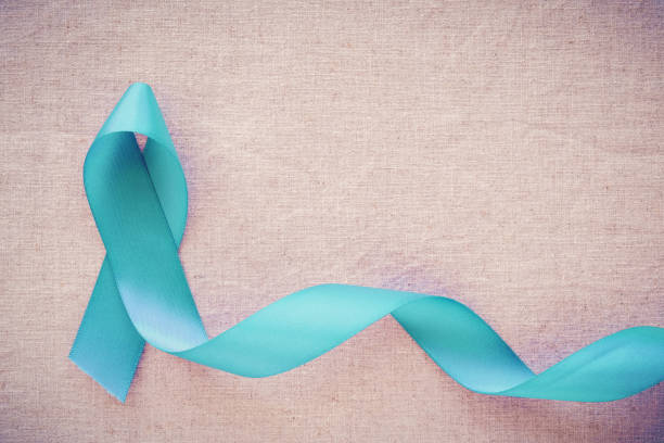 Teal Ribbon, Ovarian Cancer, cervical Cancer, and sexual assault awareness Teal Ribbon, Ovarian Cancer, cervical Cancer, and sexual assault awareness sexual violence stock pictures, royalty-free photos & images