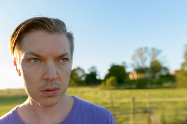 istock Young handsome man getting away from it all in nature 872288112