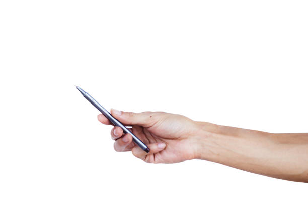 istock Hand holding pen point something text isolated on white background. Clipping path. The pen is a device used to write letters to memorize the memories on paper. Many colors such as blue, red, black. 872297636