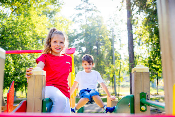 istock Kids on playground 872302390
