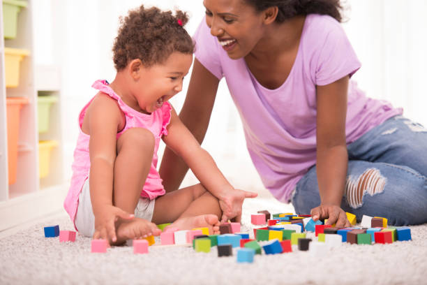 istock Mother and daughter playing time. 872304484