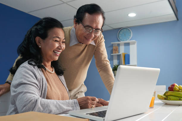 What A Funny Video Stock Photo - Download Image Now - Senior Adult, Working, Laptop - iStock What A Funny Video Stock Photo - Download Image Now - Senior Adult, Working, Laptop - iStock