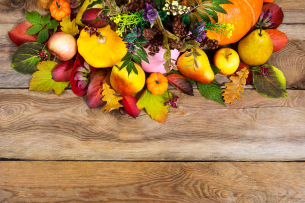 istock Fall vegetables and fruits on wooden table 872308176