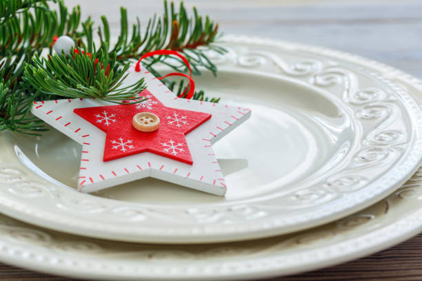 istock Christmas decor on a white porcelain plate. 872312366