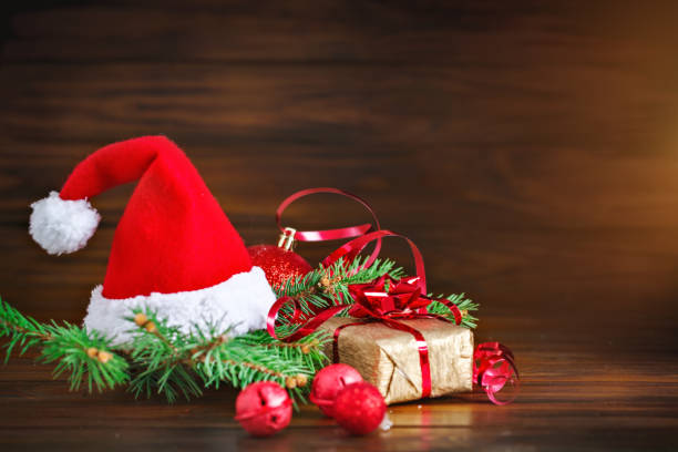 istock Christmas winter background, a table decorated with fir branches and decorations, Merry Christmas and Happy New Year 872320302