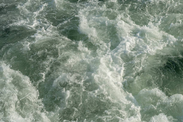 istock Turbulent Water Motion for a Green White Background 872320386