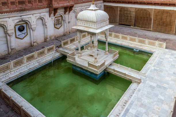 Junagarh Fort The main pool within the Junagarh Fort, India junagadh stock pictures, royalty-free photos & images
