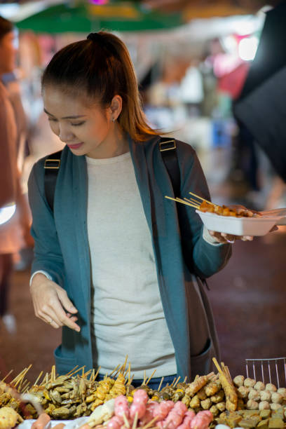 istock Choosing food at local market 872328048