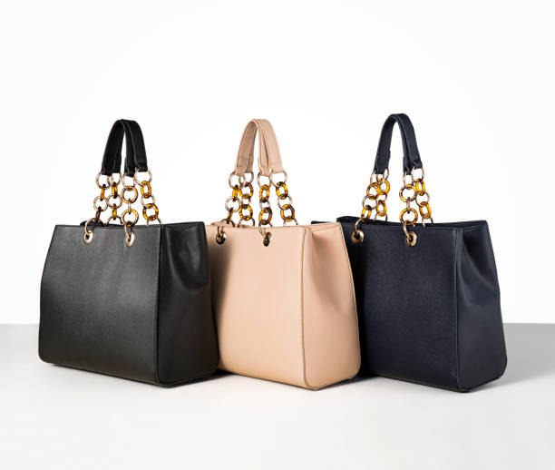 istock Leather handbags isolated on white background 872335724