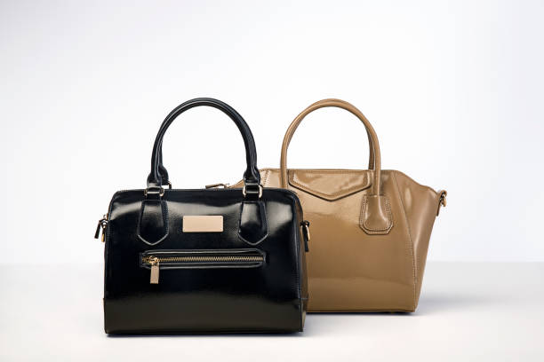 Leather handbags isolated on white background