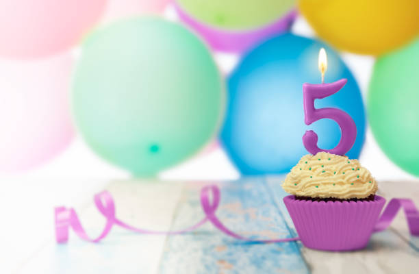 istock Birthday celebration with candle with number 5 872336336