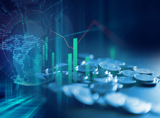 istock pile of coins on technology financial graph background. 872338948
