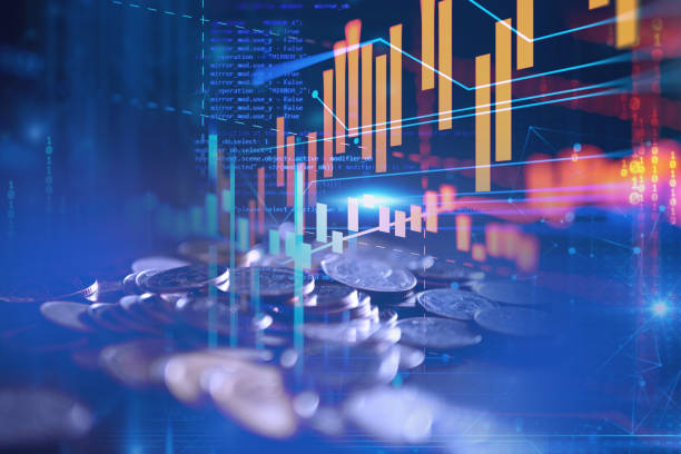 istock pile of coins on technology financial graph background. 872339378