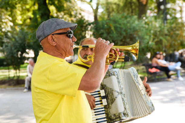 Bulgarian Street Musician Playing Trumpet and Accordion