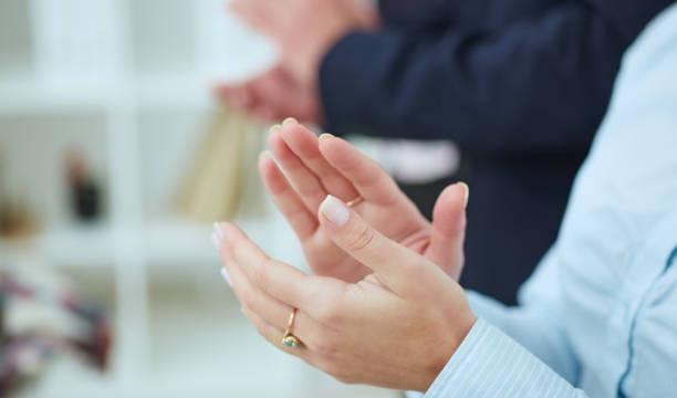 istock Cropped image of businesspeople clapping. 872348826