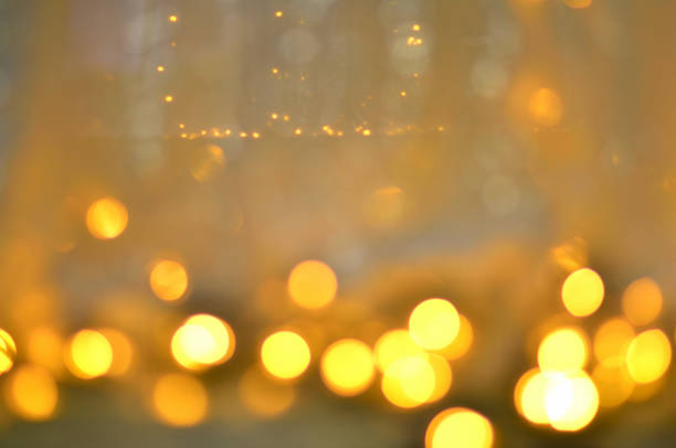 istock golden glitter texture Colorfull Blurred abstract background for birthday, anniversary, wedding, new year eve or Christmas. 872352106