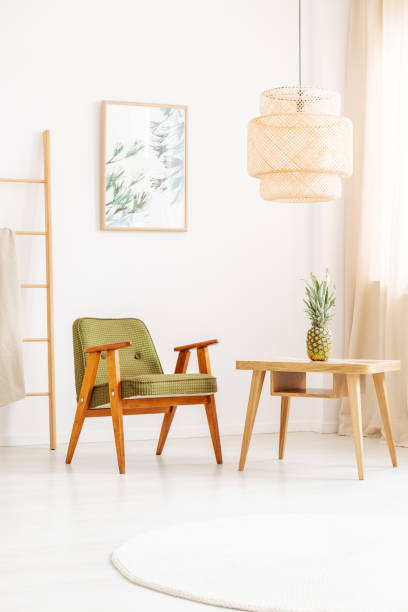 istock Vintage green armchair in room 872360698