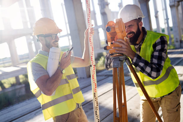 istock Portrait of construction engineers working on building site 872365326