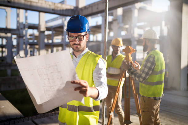 istock Portrait of construction engineers working on building site 872367974