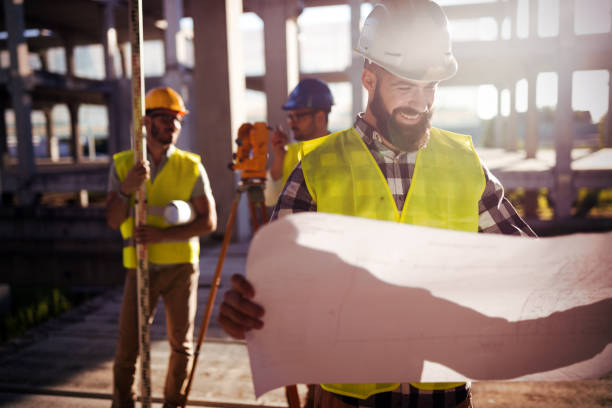 istock Picture of construction engineer working on building site 872368136
