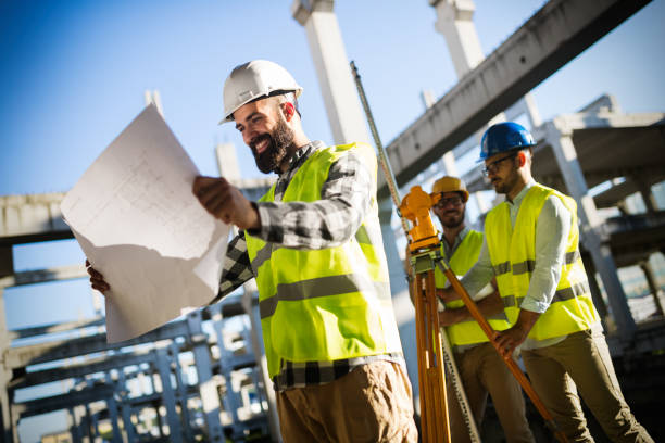 istock Portrait of construction engineers working on building site 872368186
