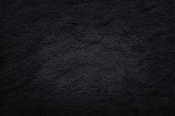 istock Dark grey black slate texture in natural pattern with high resolution for background and design art work. Black stone wall. 872369162