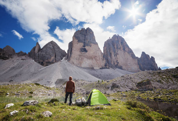 istock Hiker near the tent 872375380