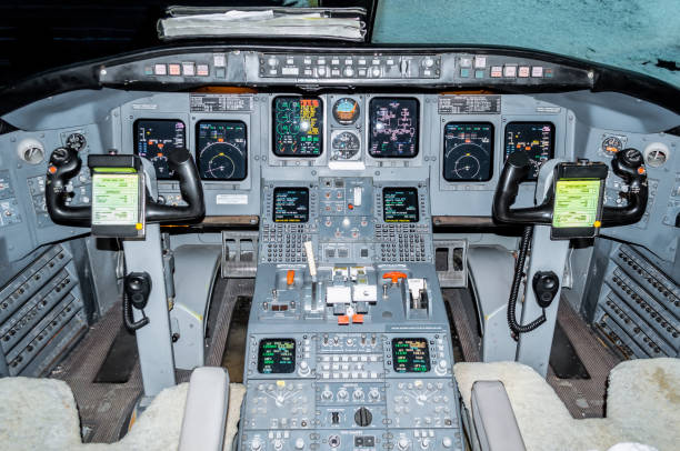 istock Cabin pilots aircraft view of the windshield, steering wheels, control devices. 872378968
