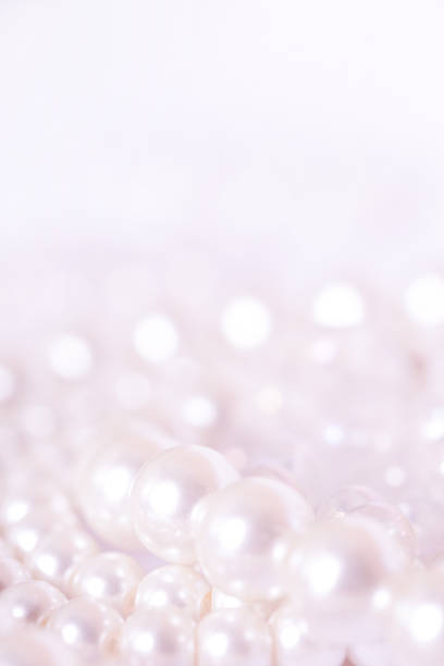 istock Pile of pearls on the white background 872393926