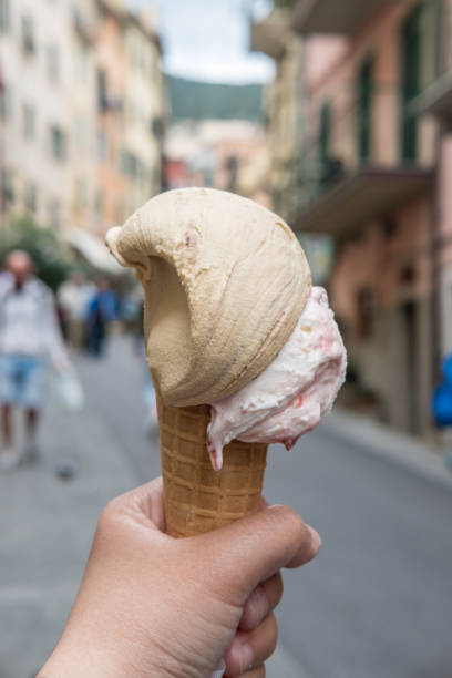 istock Hand holding Chocolate Gelato 872401050