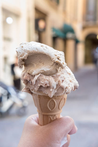 istock Hand holding Chocolate Gelato 872405008