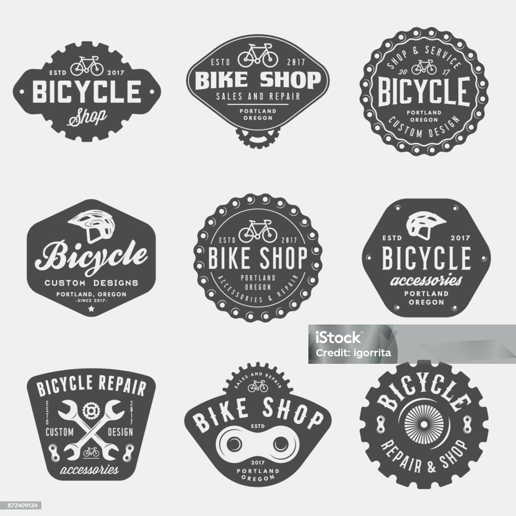 jeu de magasin de vélos vintage et réparation badges et étiquettes - clipart vectoriel de Logo libre de droits