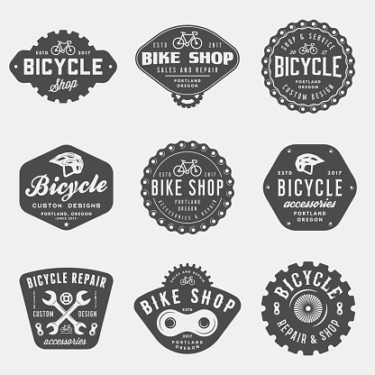 set of vintage bicycle shop and repair badges and labels. bike sales and service. vector illustration