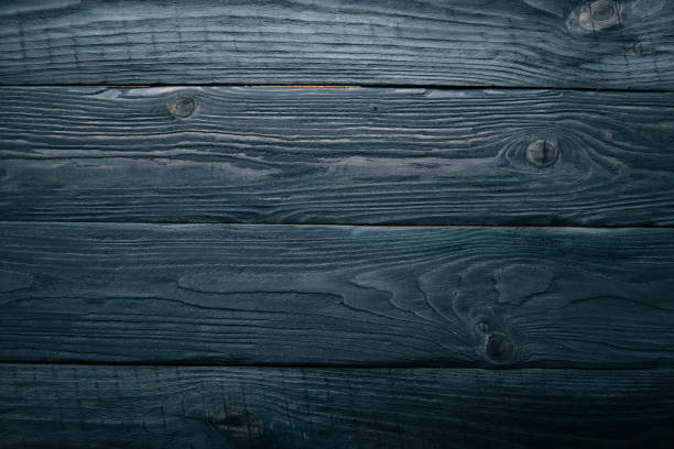 istock Black wooden background. Texture. Top view. Free space. 872409596