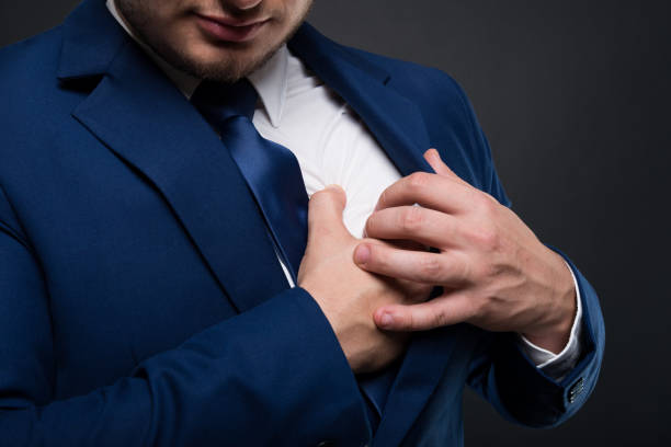 istock Businessman has heart attack because of stress 872409918