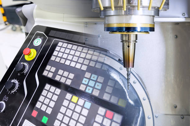 istock Abstract scene of The 5 axis CNC machine and the control panel 872412946