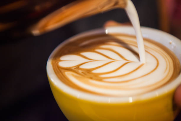 istock Barista Pouring Latte Art 872414448