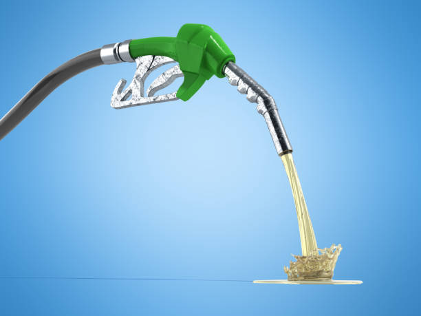 istock eco Fuel concept nozzle pump with hose 3d render on blue background 872417742