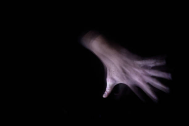 istock Long exposure of hand 872418224