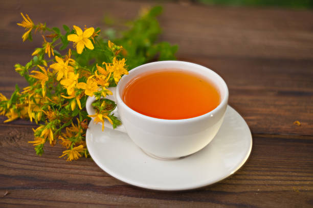 delicious tutsan tea in a beautiful glass bowl on table