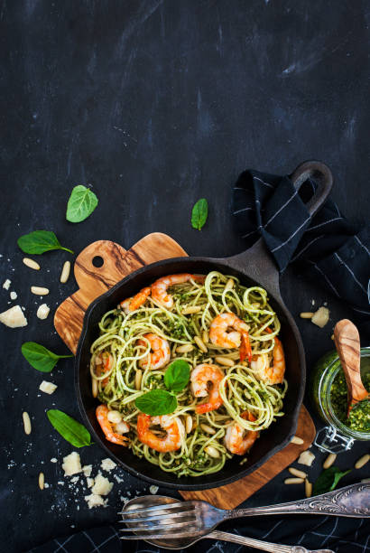 istock Spaghetti with prawns and homemade pesto sauce 872421444