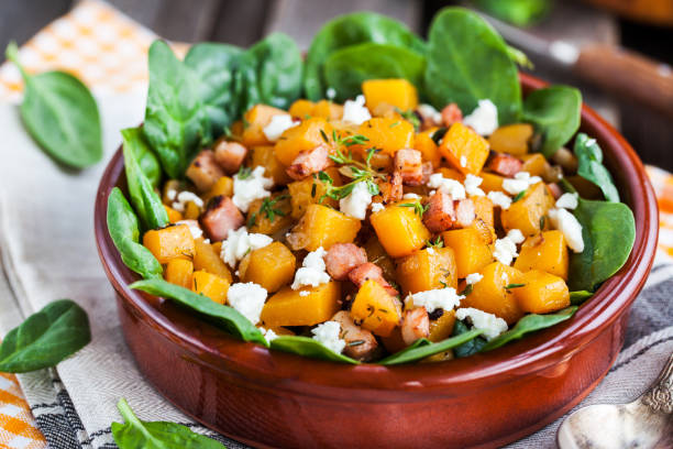 Delicious butternut squash, bacon, spinach and feta cheese warm salad
