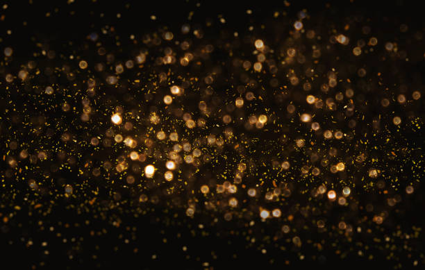 istock Gold abstarct background and confetti 872429436