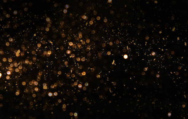 istock Gold abstarct background and confetti 872429672