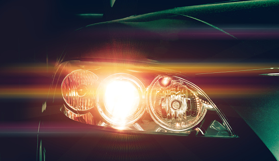 Car headlights. Exterior detail. Car luxury concept