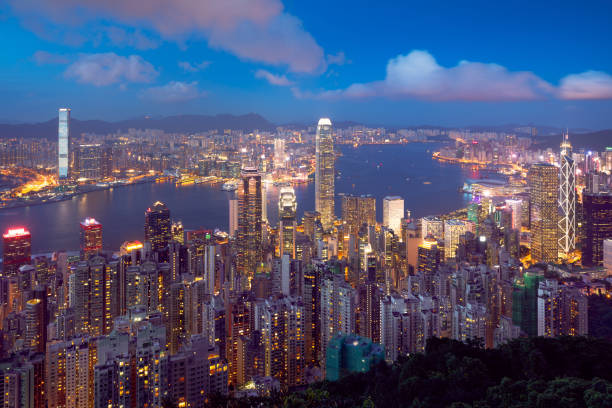 istock Hong Kong skyline at dusk 872457002