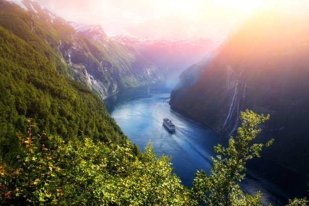 Breathtaking view of Sunnylvsfjorden fjord Breathtaking view of Sunnylvsfjorden fjord and famous Seven Sisters waterfalls, near Geiranger village in western Norway. cruising stock pictures, royalty-free photos & images